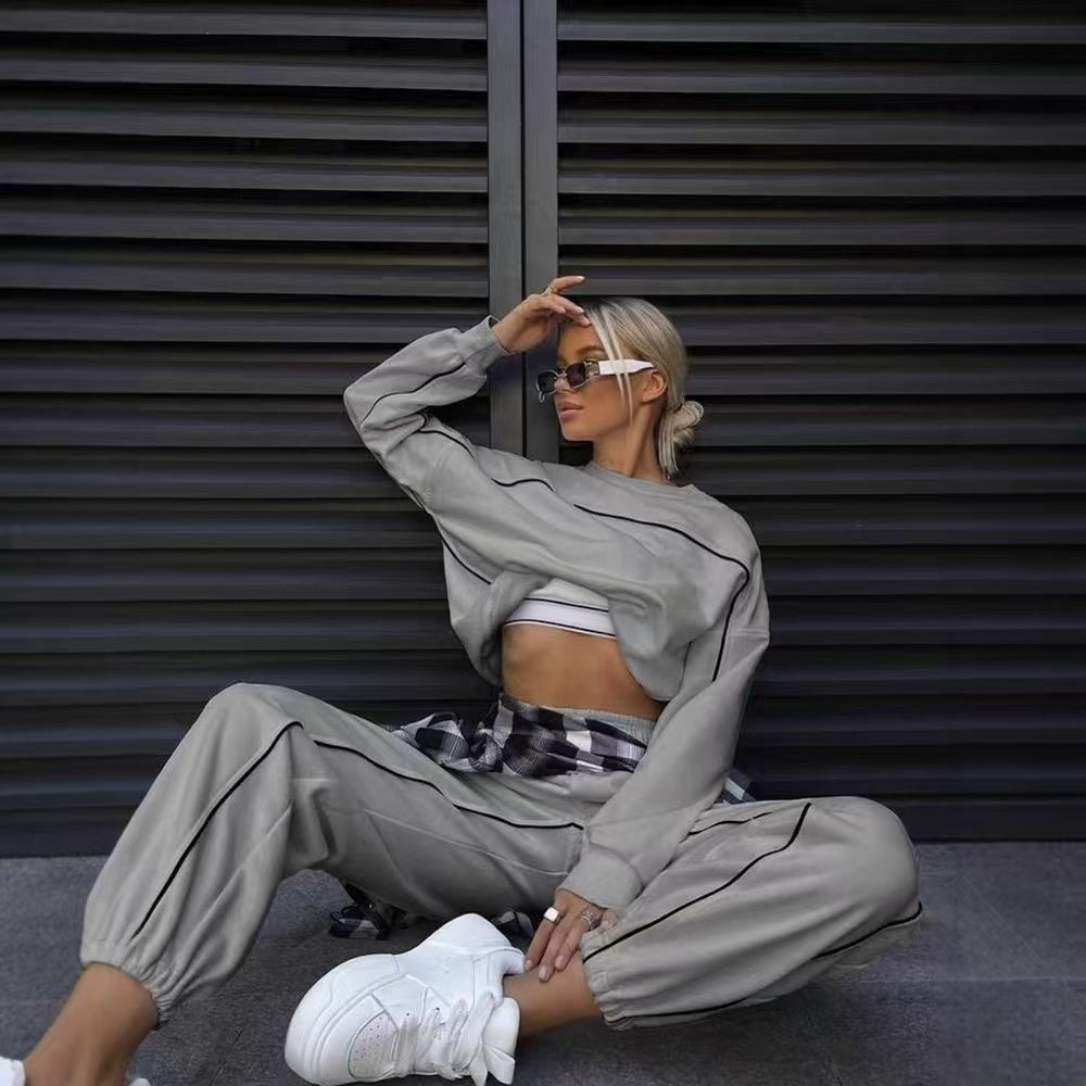 Solid color casual long sleeved sports suit  E1462